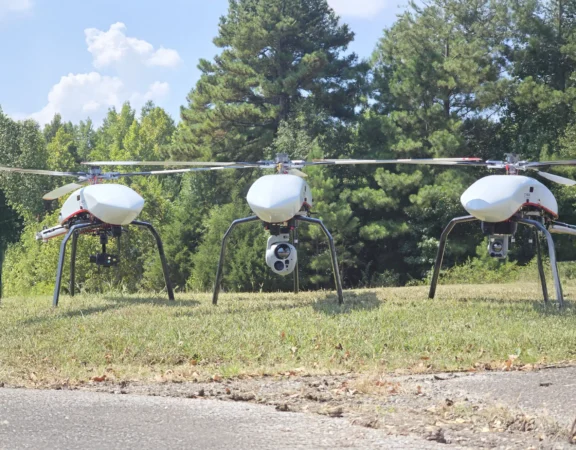 Velos V3 UAV helicopters equipped with a Gremsy VIO F1, Trillium HD 55, and NextVision Raptor. All EO-IR cameras are capable of being attached as payload to a Velos V3 easily.