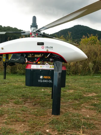 The RIEGL VQ 840 GL LiDAR is attached to a Velos V3 UAV helicopter.